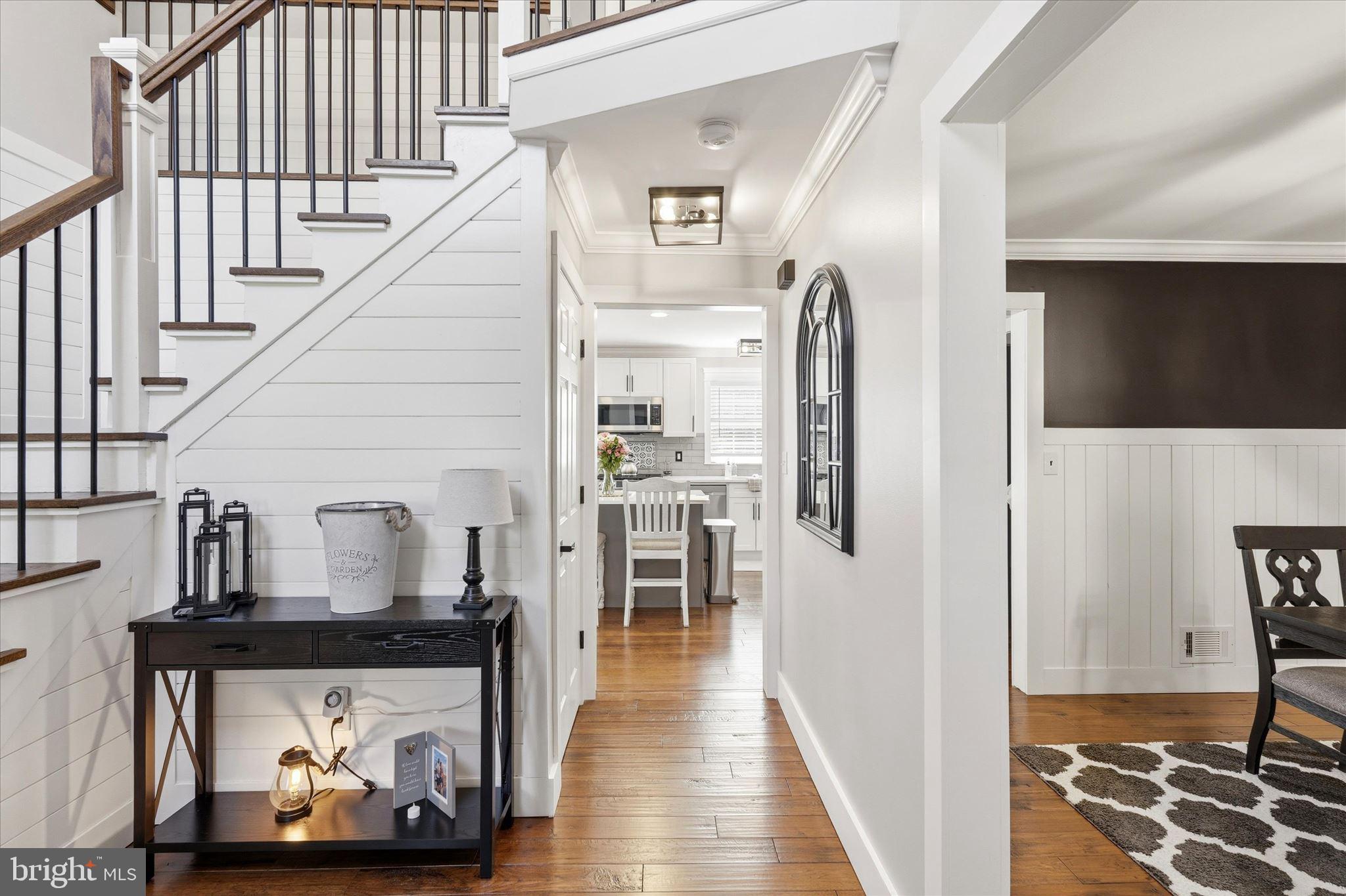 176 Warren Grove Road Barnegat, NJ 08005 - Photo 13 of 71 a view of a hallway with wooden floor and staircase