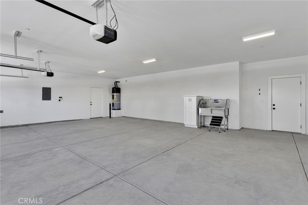 20112 Sahale Road Apple Valley, CA 92307 - Photo 42 of 67 Inside Garage Dog Wash Station