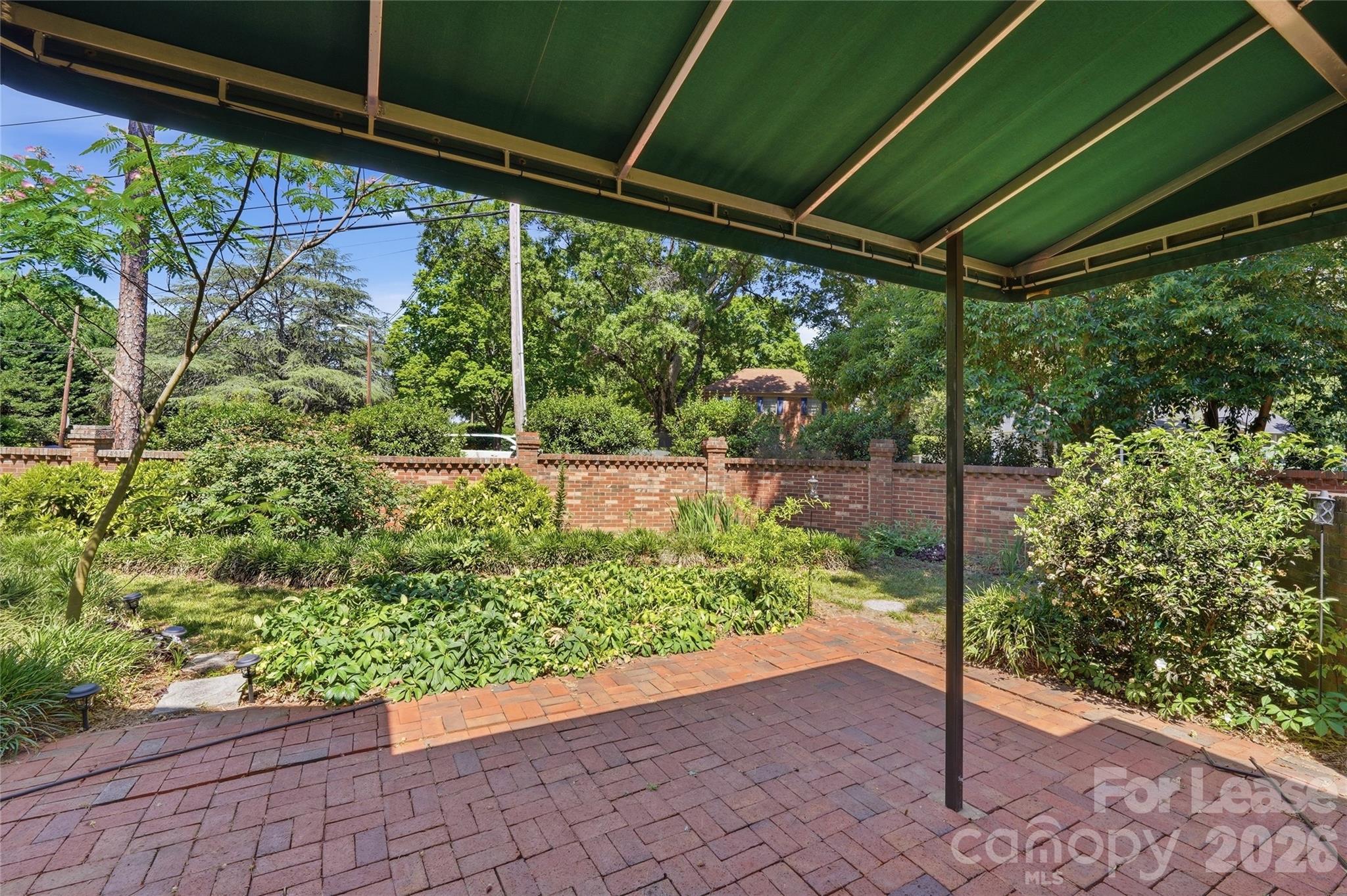 5906 Sharon Hills Road Charlotte, NC 28210 - Photo 27 of 30 a view of a backyard with garden