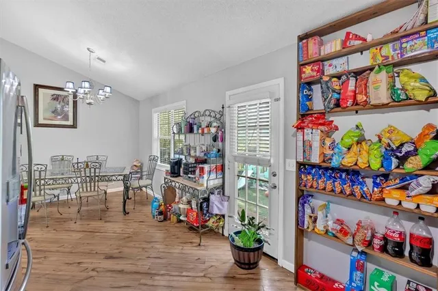 a room with furniture and a book shelf