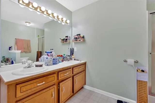 a bed room with a bed and a window