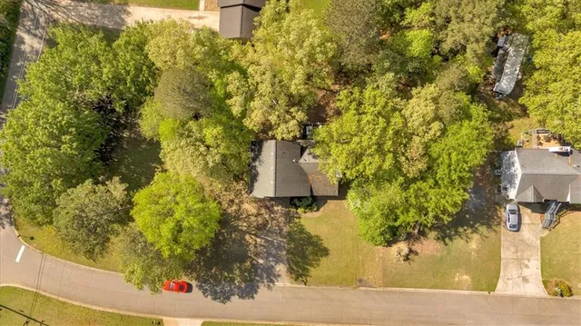 a view of a porch and garden