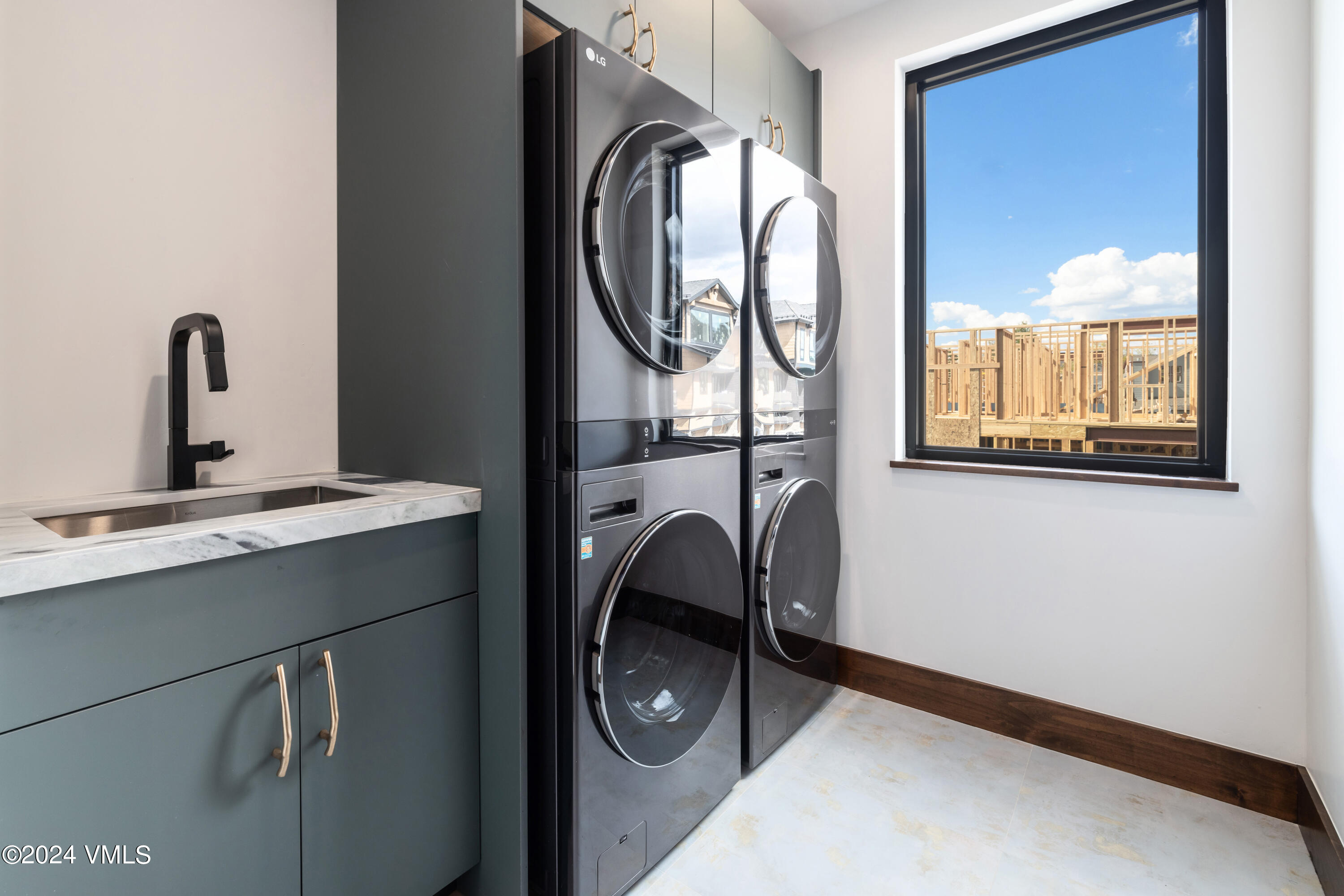 100 Goldfinch Lane, Unit 2B Avon, CO 81620 - Photo 29 of 47 a bathroom with a sink mirror and toilet