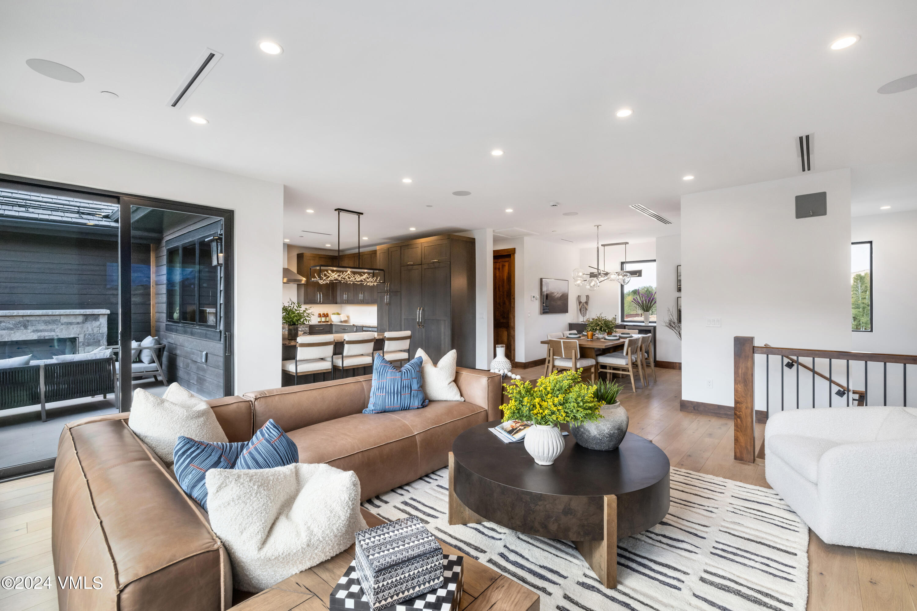 100 Goldfinch Lane, Unit 2B Avon, CO 81620 - Photo 4 of 47 a living room with furniture and a table