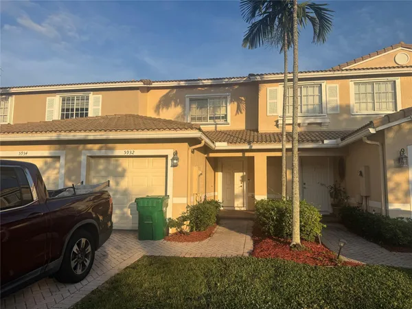a view of a house with a patio