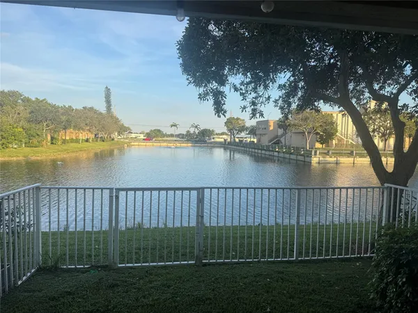 a view of a pathway with a lake view