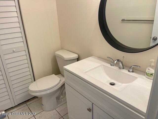 3243 Beach View Way Melbourne Beach, FL 32951 - Photo 12 of 35 a bathroom with a sink and a mirror