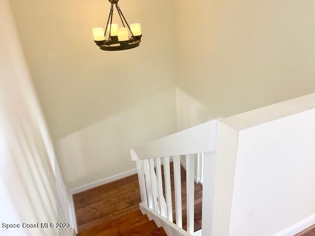 3243 Beach View Way Melbourne Beach, FL 32951 - Photo 16 of 35 a view of a hallway with staircase