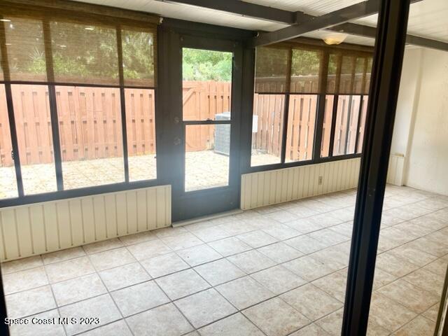3243 Beach View Way Melbourne Beach, FL 32951 - Photo 17 of 35 a view of an empty room with a window