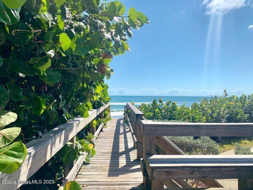 3243 Beach View Way Melbourne Beach, FL 32951 - Photo 25 of 35 a view of a balcony with wooden floor