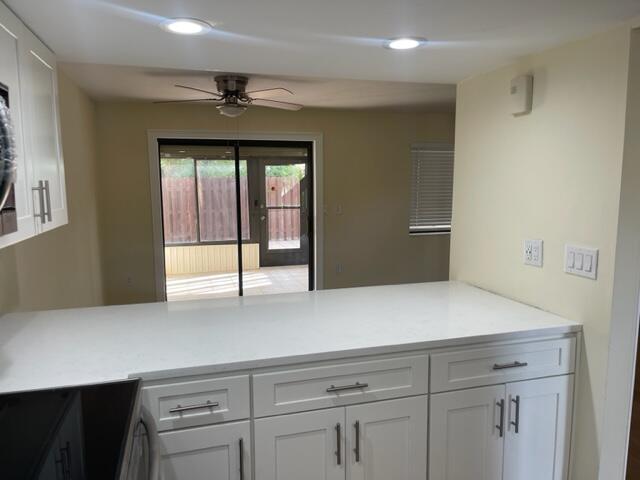 3243 Beach View Way Melbourne Beach, FL 32951 - Photo 3 of 35 a hallway with a large window and furniture