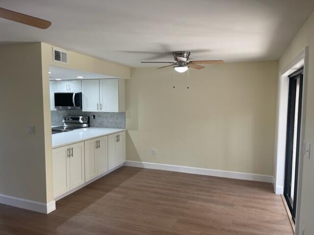 3243 Beach View Way Melbourne Beach, FL 32951 - Photo 5 of 35 a view of a kitchen with electric appliances