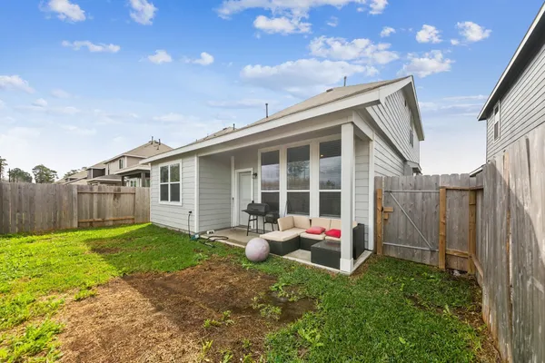 a house with garden in front of it