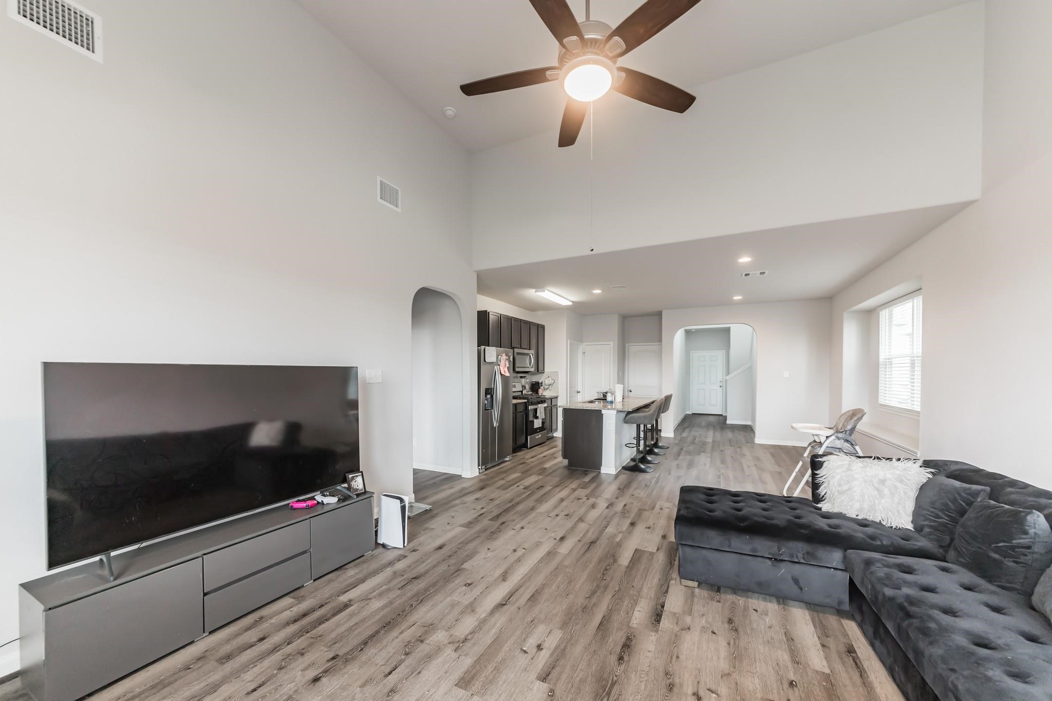 23534 Goodfellow Drive Spring, TX 77373 - Photo 5 of 13 a living room with furniture and a flat screen tv