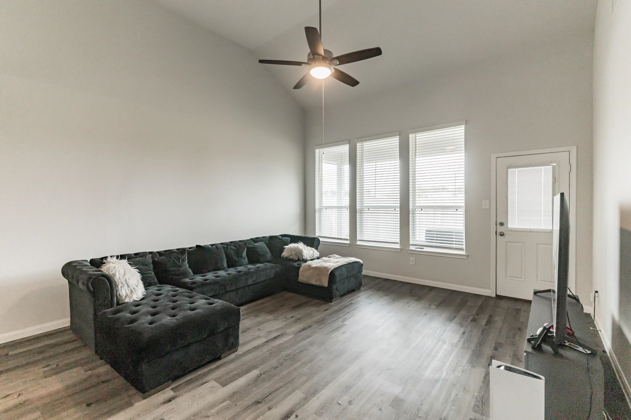 23534 Goodfellow Drive Spring, TX 77373 - Photo 6 of 13 a living room with furniture and a large window
