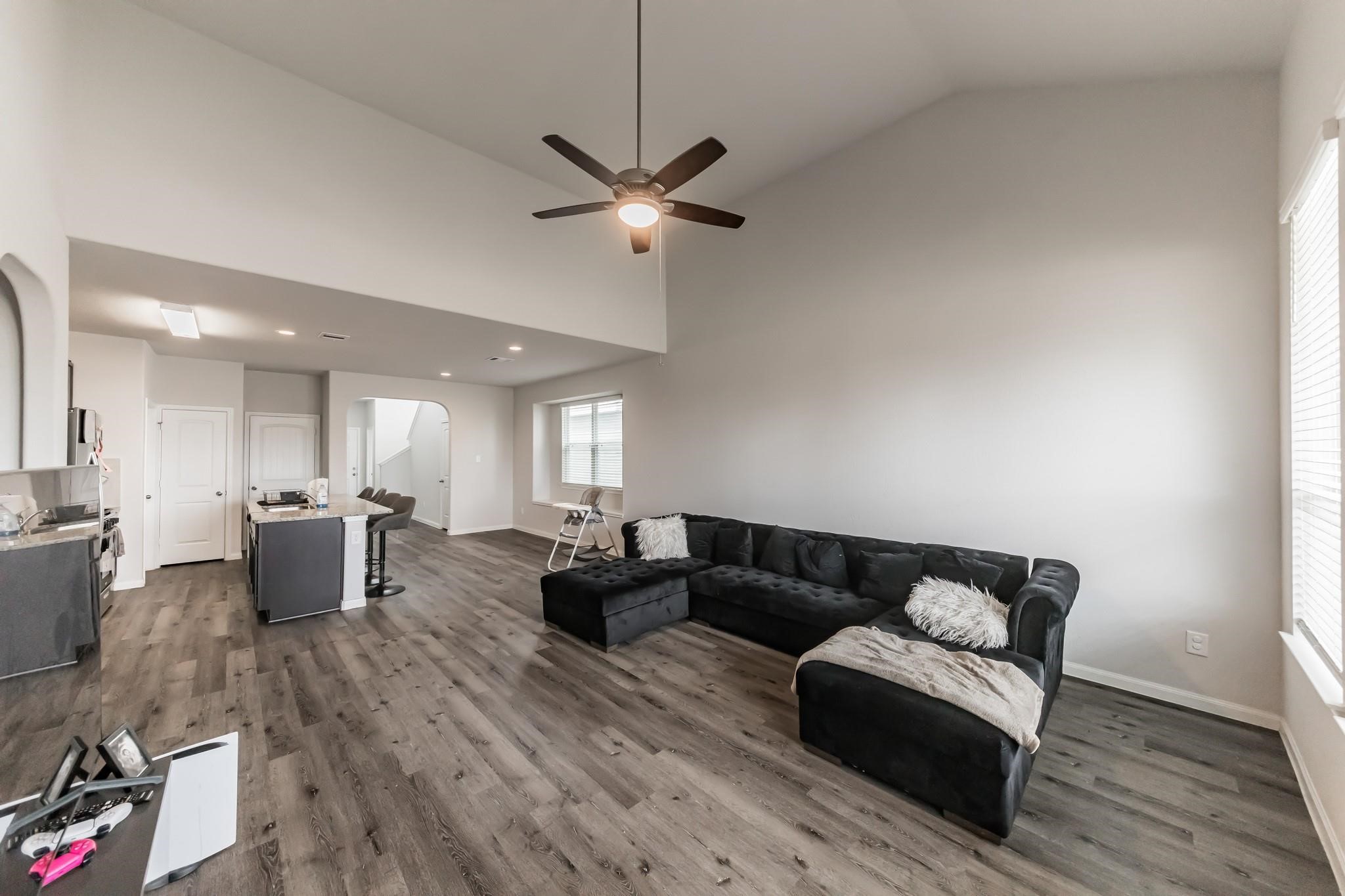 23534 Goodfellow Drive Spring, TX 77373 - Photo 7 of 13 a living room with furniture and a wooden floor