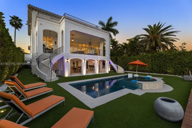 a view of swimming pool with chairs