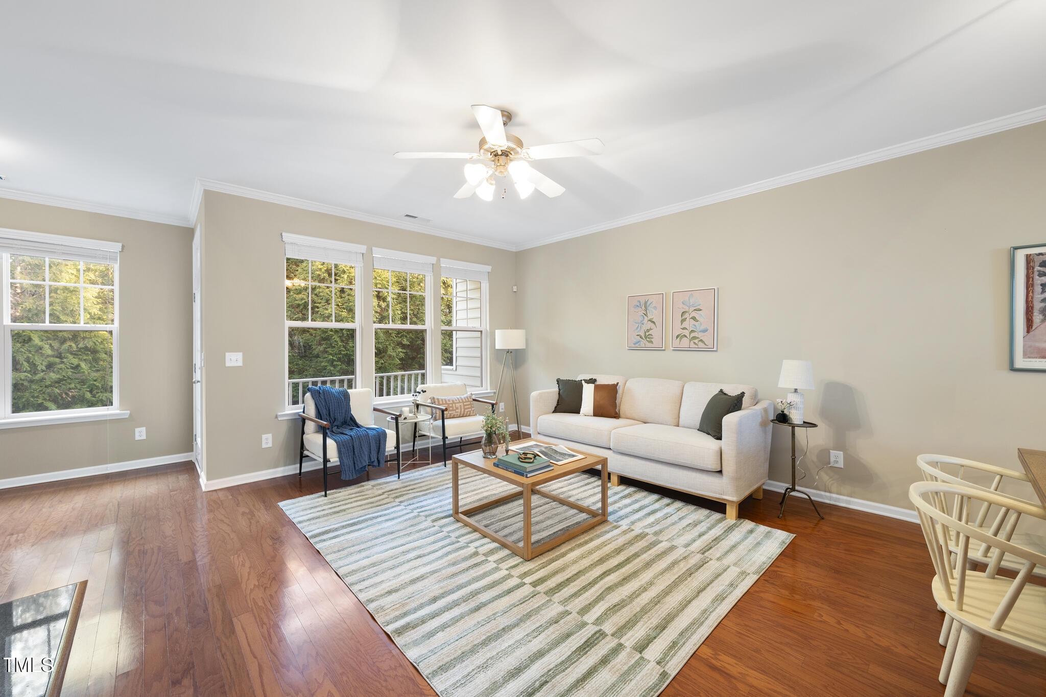 5006 Celtic Court Raleigh, NC 27612 - Photo 4 of 28 a living room with furniture and a large window