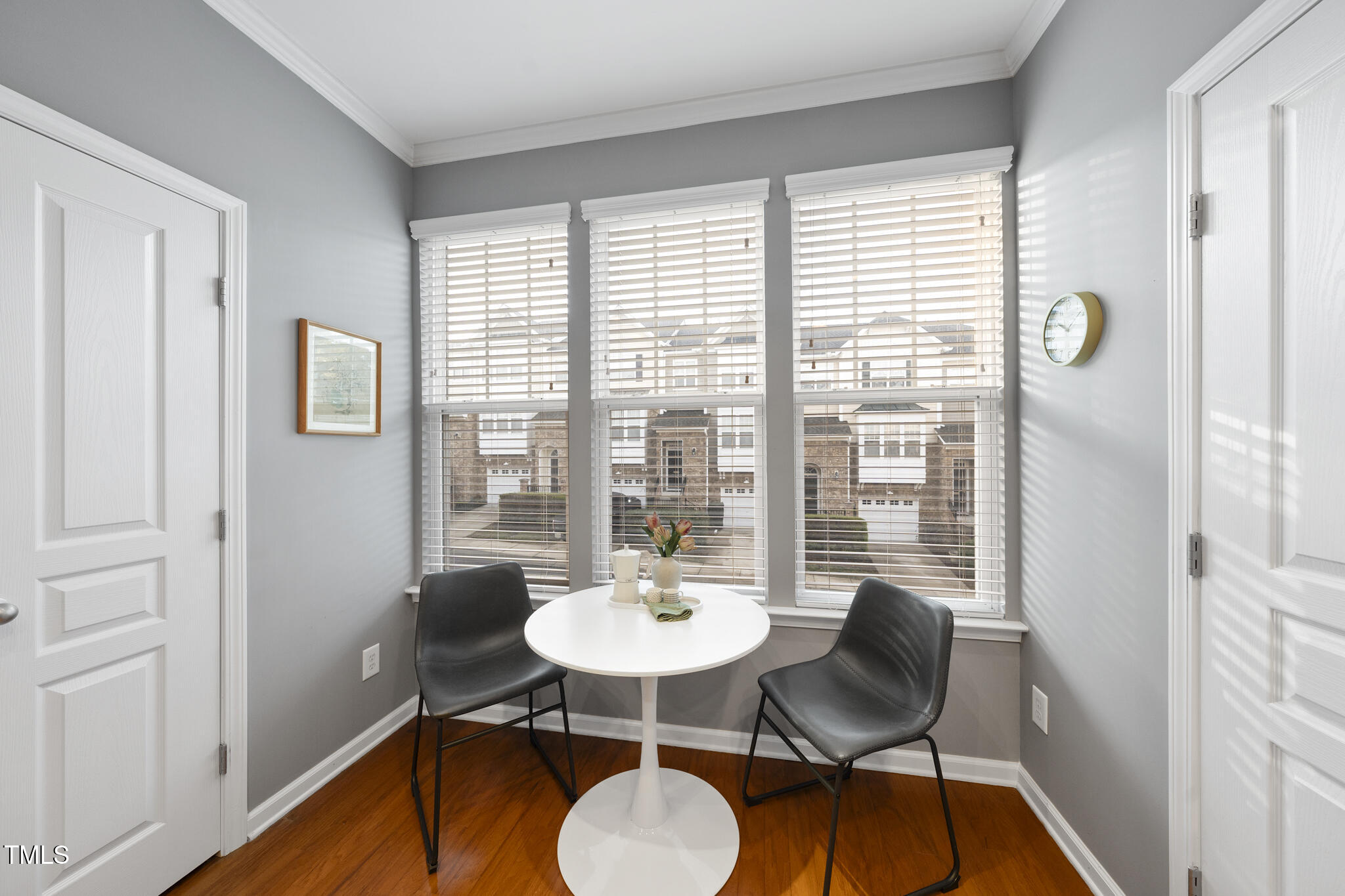 5006 Celtic Court Raleigh, NC 27612 - Photo 9 of 28 a view of a room with a table and chairs