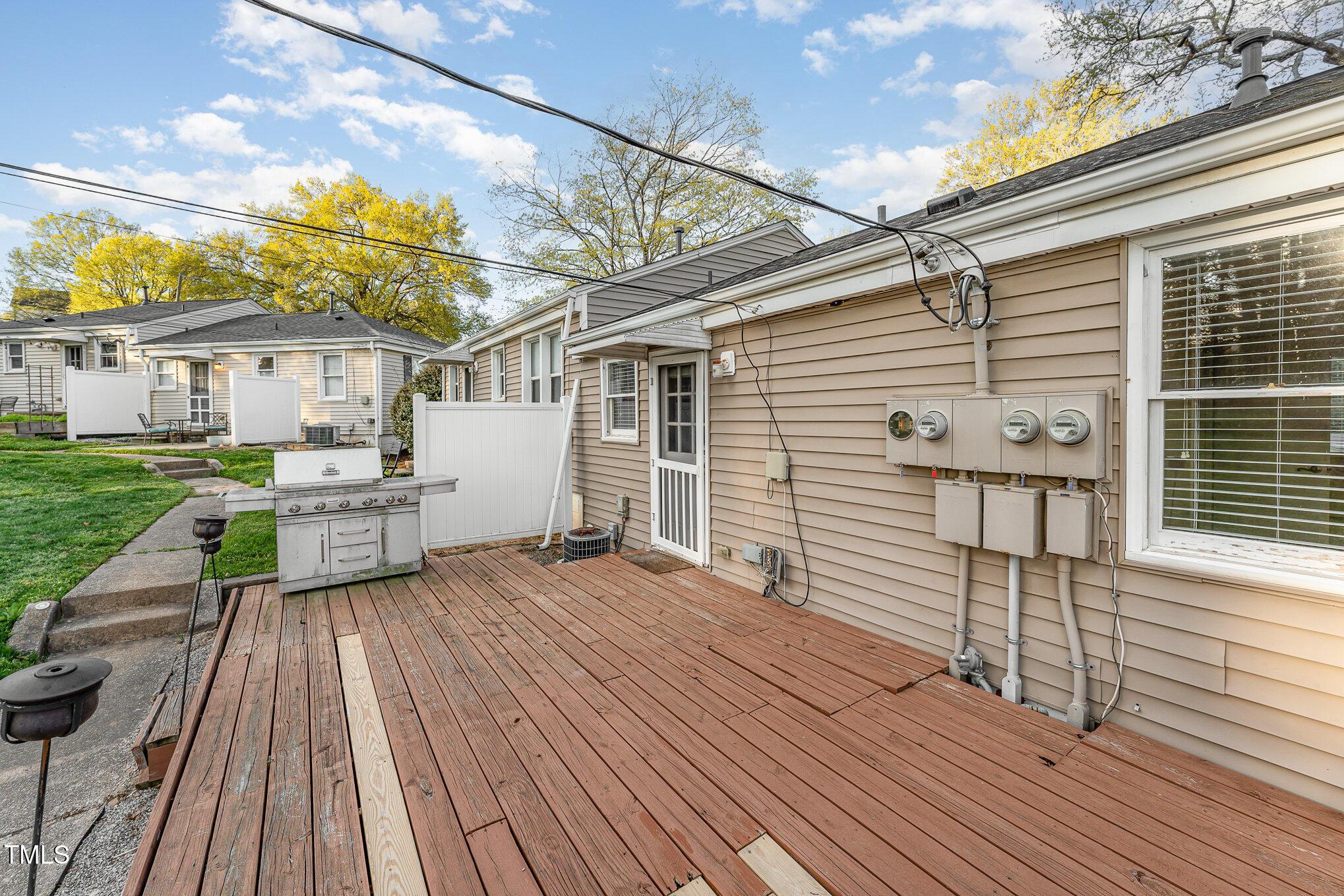2302 Bernard Street Raleigh, NC 27608 - Photo 14 of 16 a view of a house with a deck