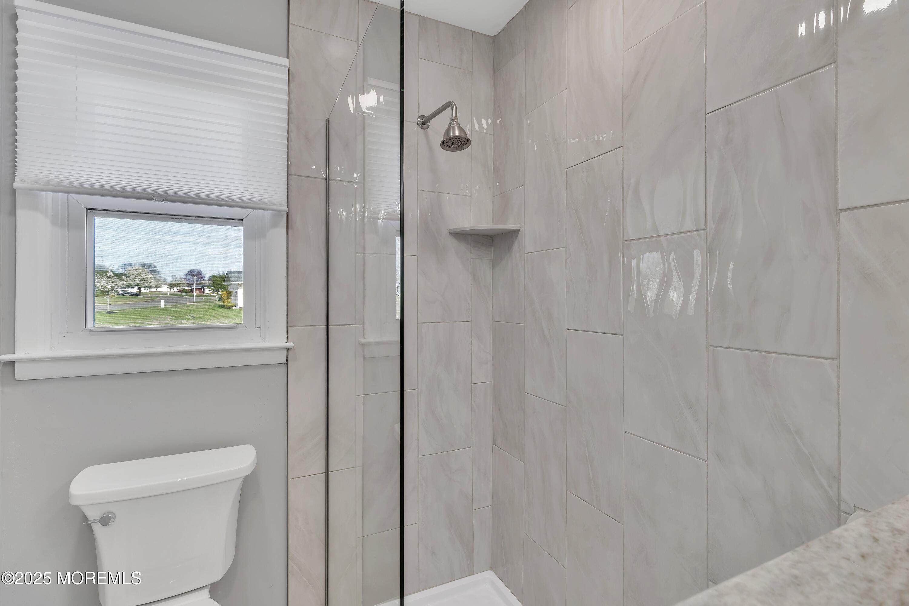 1 Markham Road Brick, NJ 08724 - Photo 25 of 63 a bathroom with a toilet and a shower
