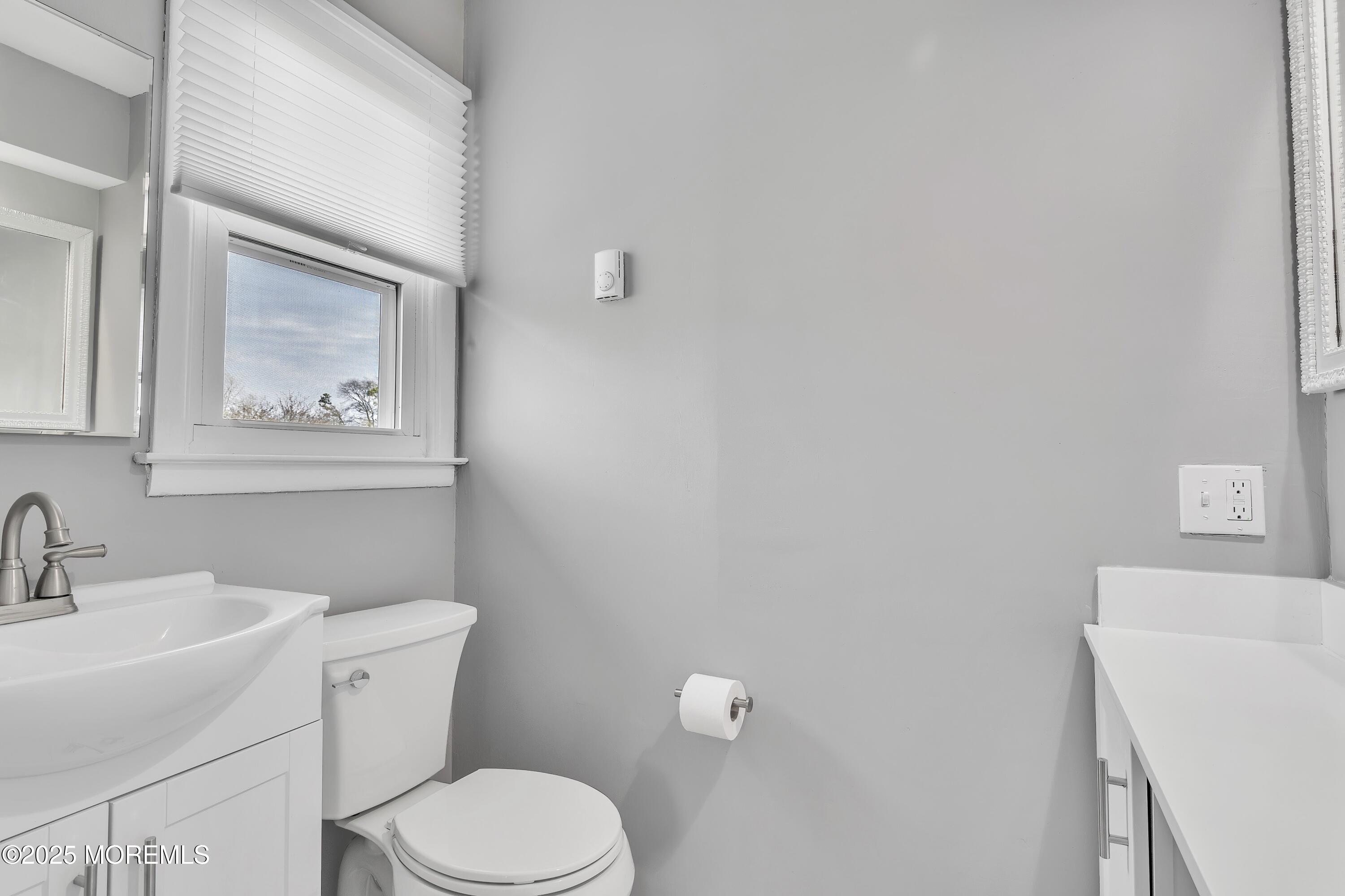 1 Markham Road Brick, NJ 08724 - Photo 30 of 63 a white toilet sitting next to a bathroom sink