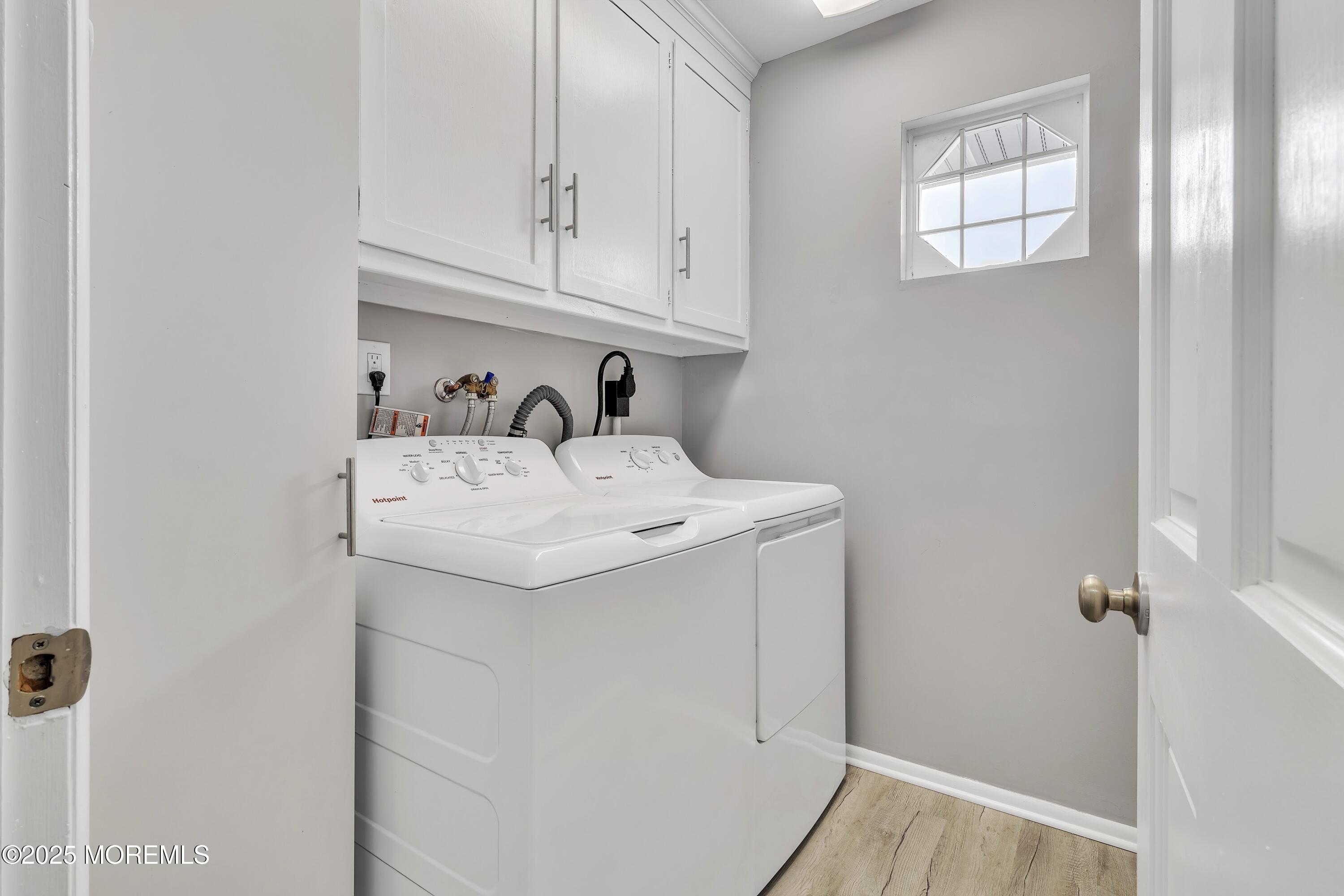 1 Markham Road Brick, NJ 08724 - Photo 43 of 63 a utility room with cabinets washer and dryer