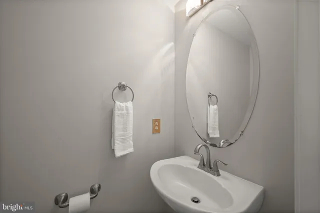 a kitchen with a sink stove and refrigerator