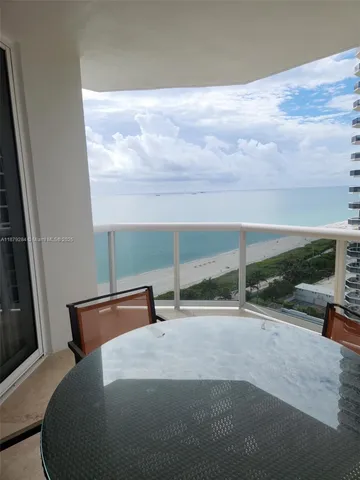 a view of a room with a furniture