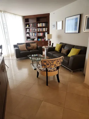 a kitchen with stainless steel appliances a refrigerator sink and cabinets