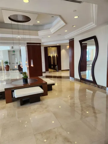 a view of a swimming pool with a terrace