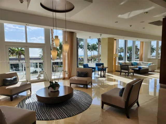 a view of a swimming pool with trees