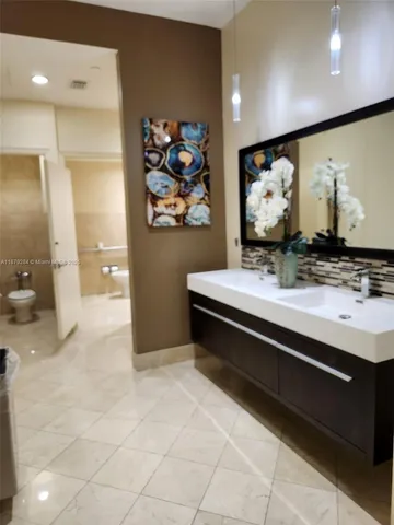 a front of a building with a yard