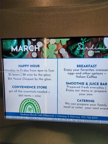 a view of a brick house with a small yard