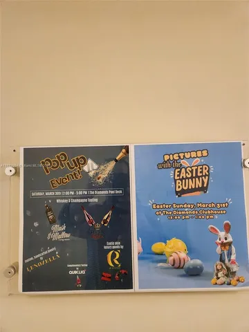 a view of a balcony with two chairs and a table