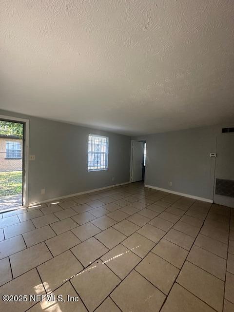 3250 Phyllis Street Jacksonville, FL 32205 - Photo 6 of 9 a view of an empty room and window