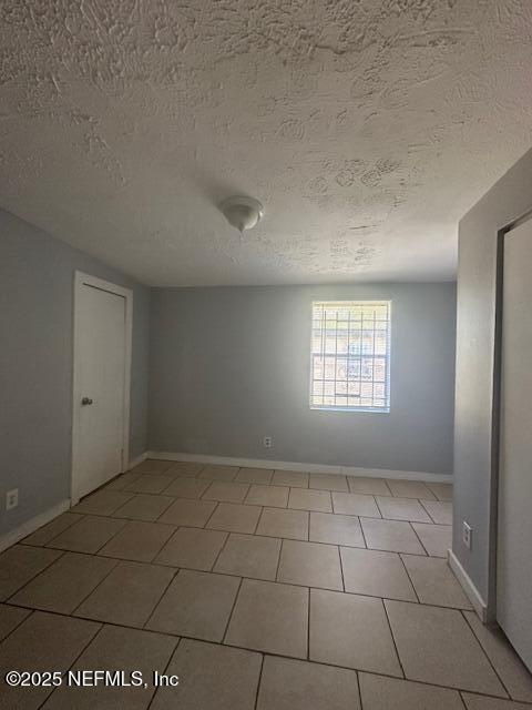 3250 Phyllis Street Jacksonville, FL 32205 - Photo 7 of 9 a view of an empty room and window