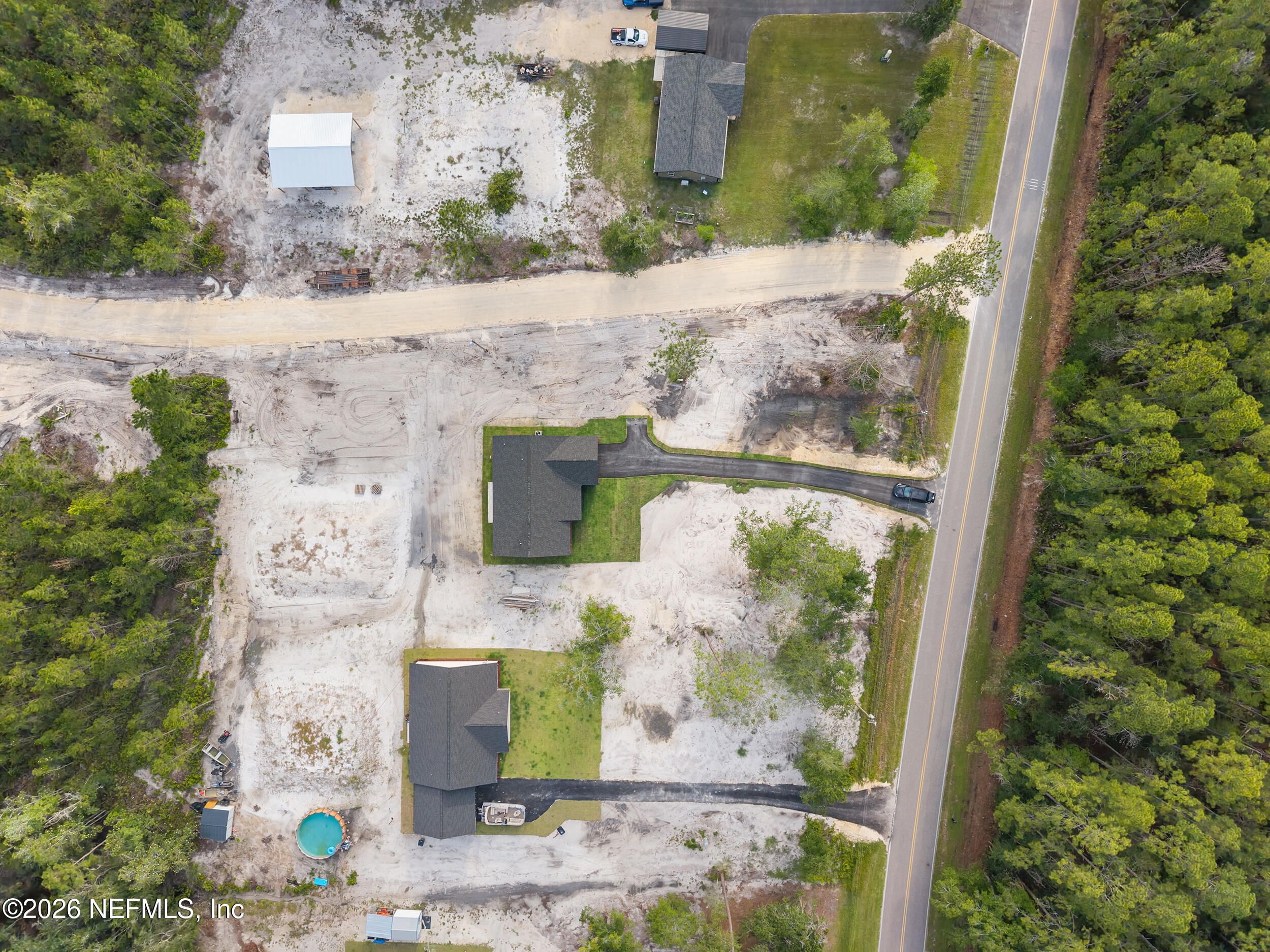 9284 Southwest Sw Cr Hampton, FL 32044 - Photo 46 of 48 DJI_20260625184541_0352_D