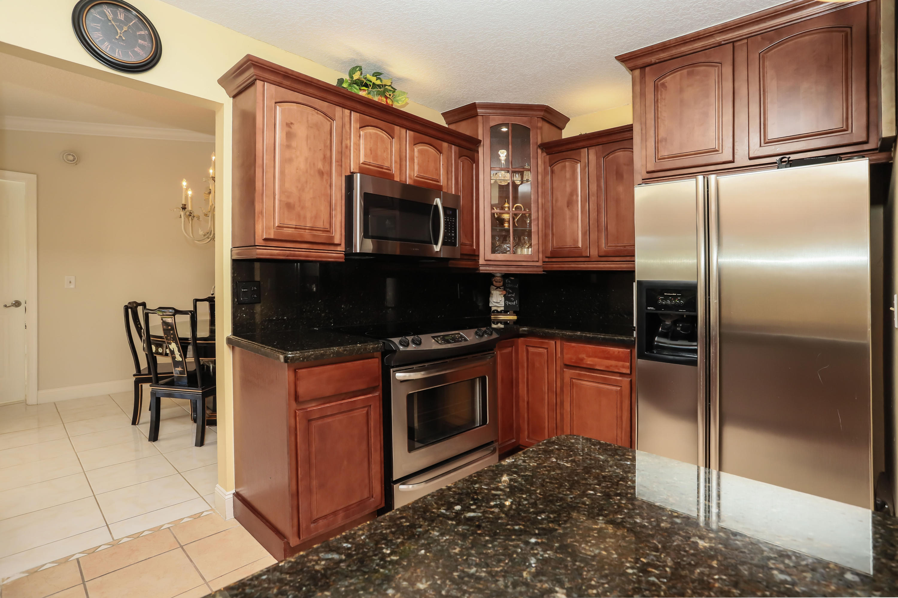 23090 Southwest 53rd Avenue Boca Raton, FL 33433 - Photo 4 of 19 Kitchen w/stainless steel appliances