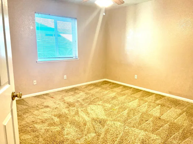 a view of a room with a window