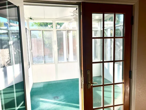 a view of a room that has a large window