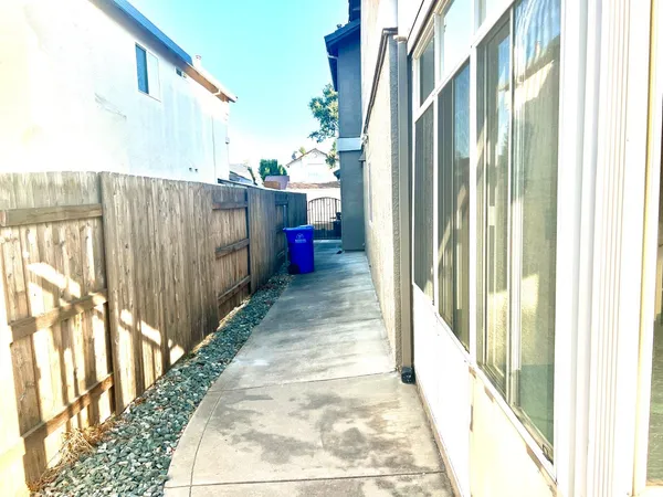 a view of a pathway of a building from a balcony