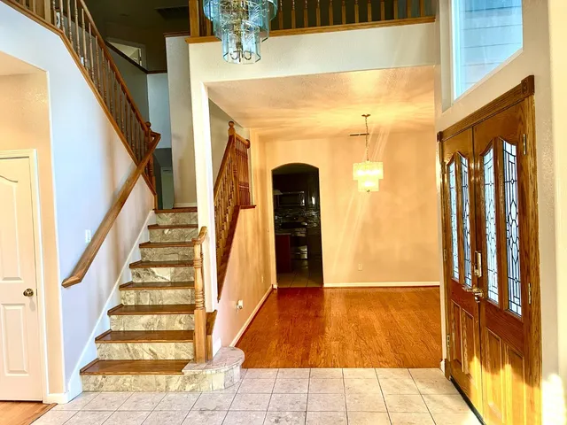 a view of entryway with a front door