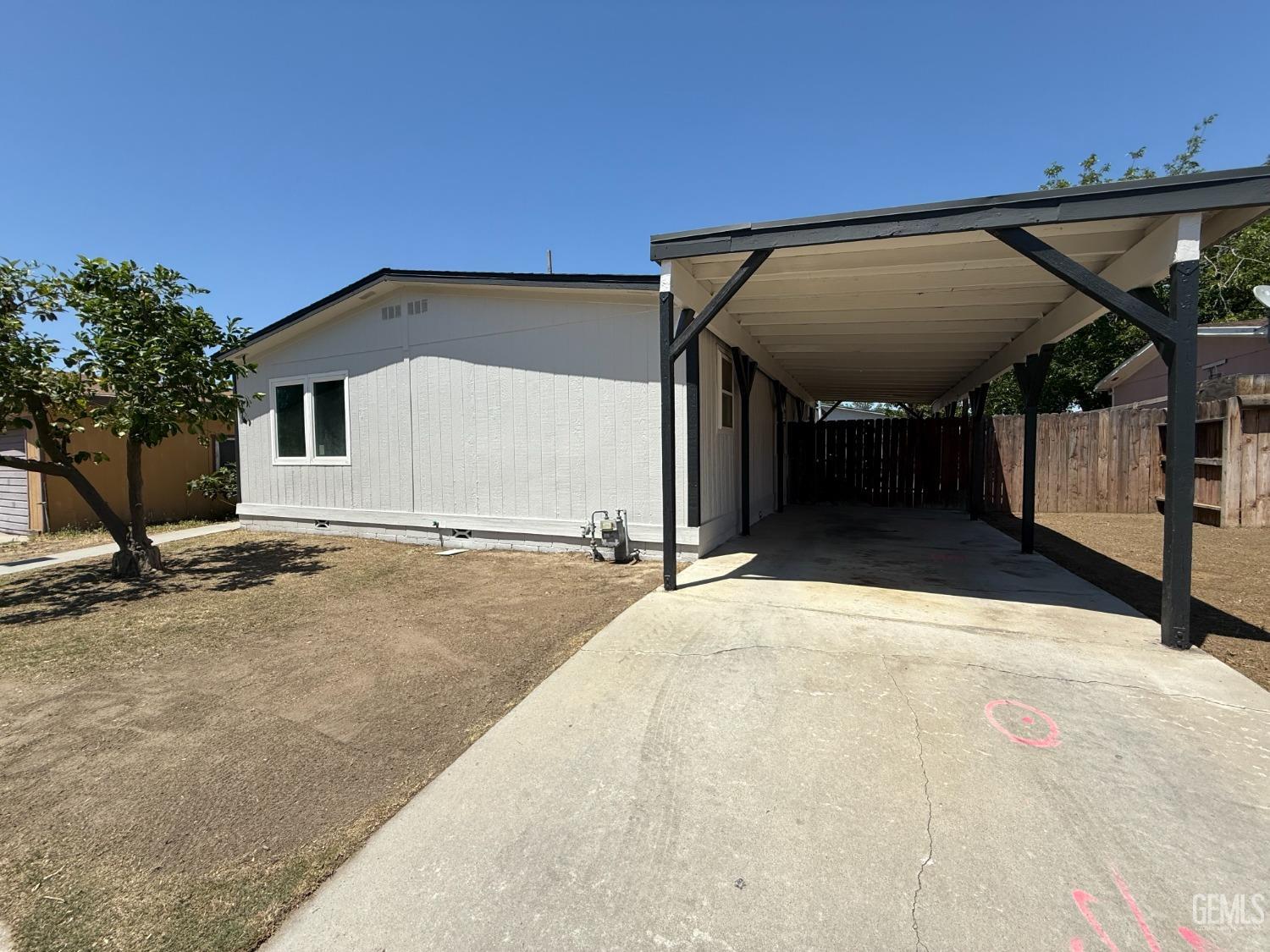 Undisclosed Address Bakersfield, CA 93307 - Photo 2 of 27 a view of a house