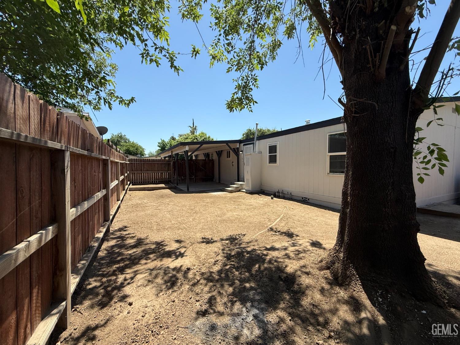 Undisclosed Address Bakersfield, CA 93307 - Photo 25 of 27 a view of wooden fence