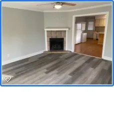 a black and white photo of a living room