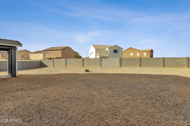 an aerial view of residential building and ocean