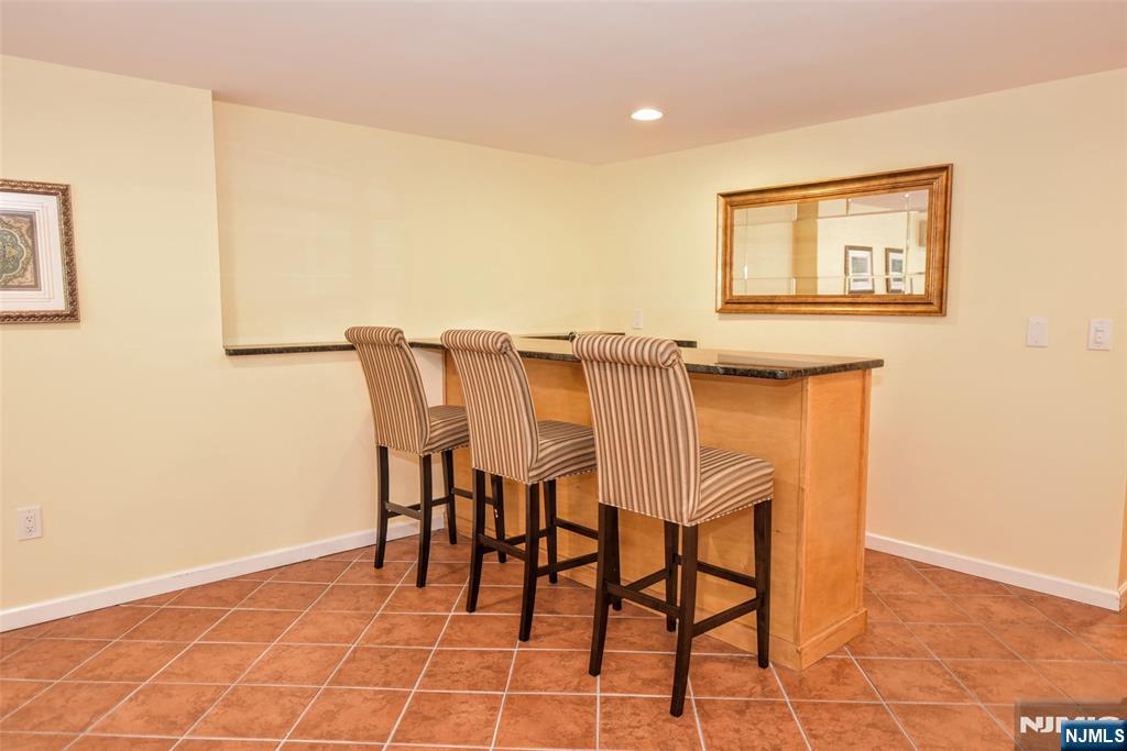 60 Dimmig Road Upper Saddle River, NJ 07458 - Photo 35 of 40 a view of a dining room with furniture