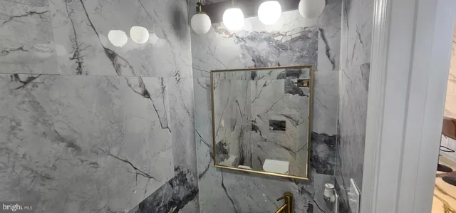 a bedroom with a bed and a table