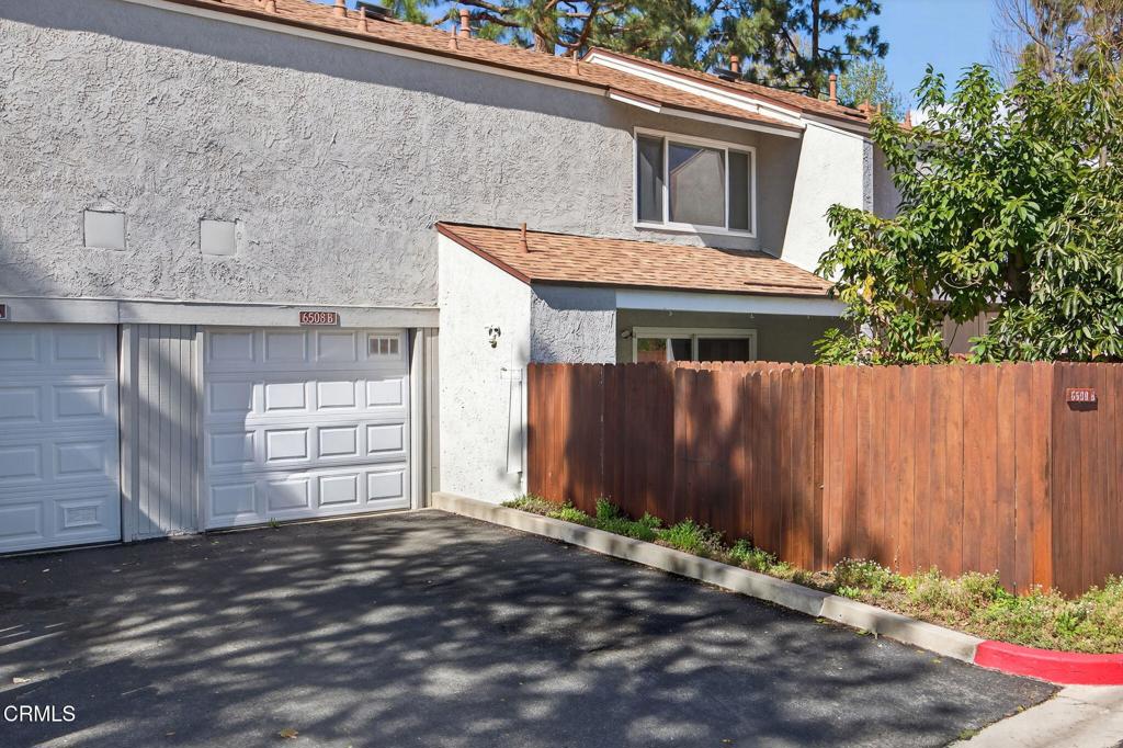 6508 Penn Street, Unit B Moorpark, CA 93021 - Photo 27 of 27 a front view of a house with a garage